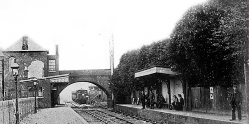 old railway station with a bridge