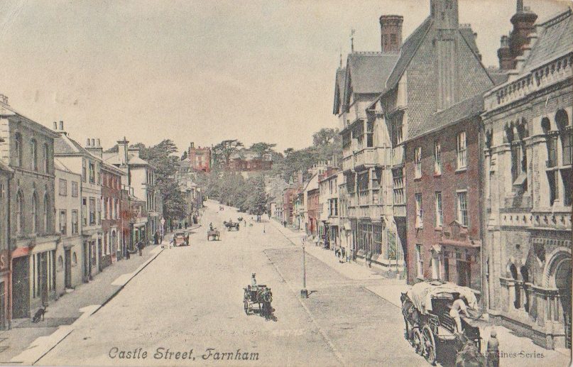 Castle Street in Farnham, Surrey, on a historical postcard posted in July 1905
