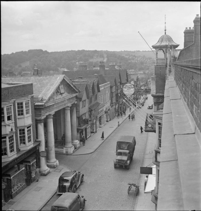 Guildford High Street in 1945, with the Corn Exchange on the left and Guildhall on the right